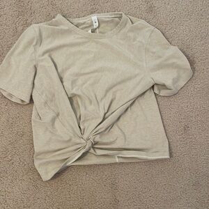 Size 4 gold Lululemon top